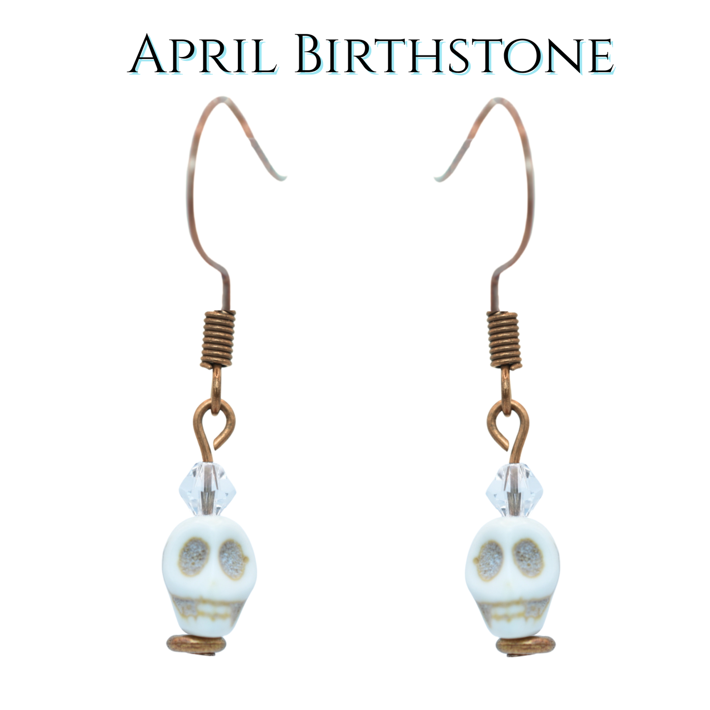 Earrings with skull beads and crystal beads on a white background, labeled 'April Birthstone'.