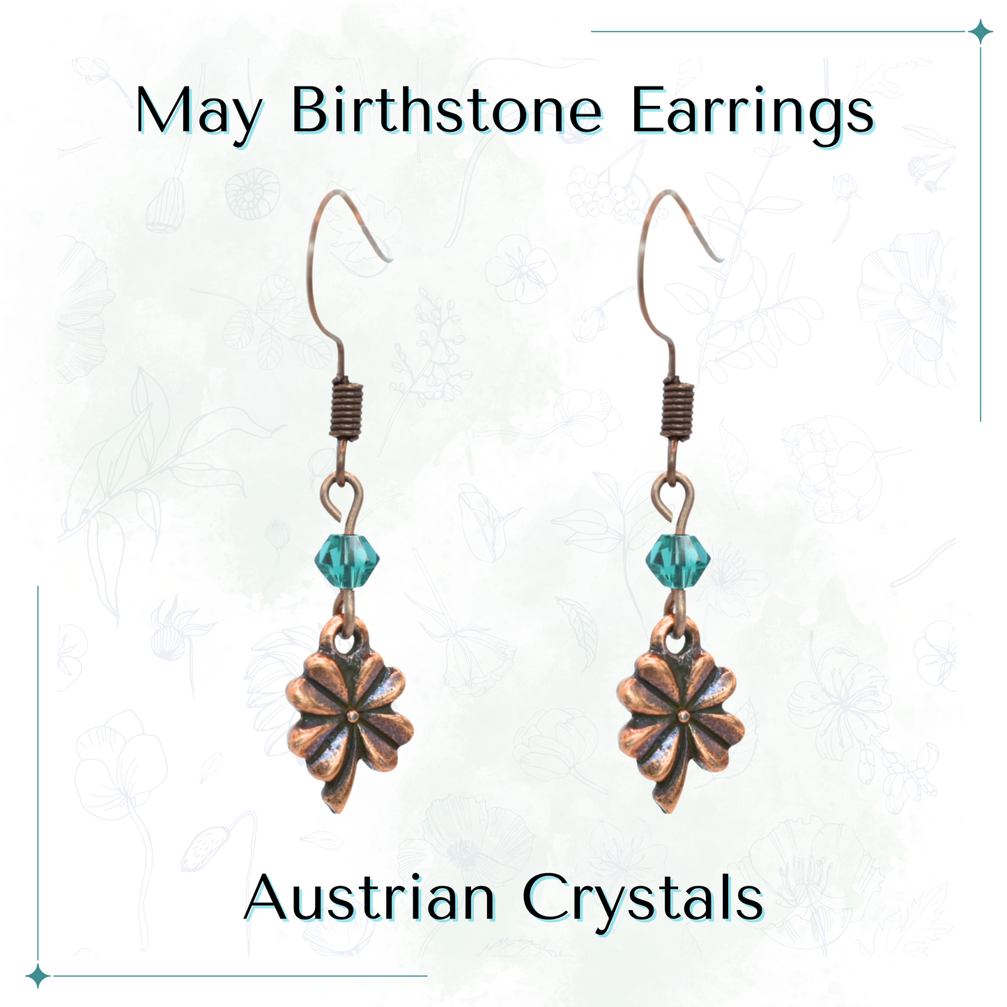 Pair of antique copper four leaf clover earrings with emerald green Austrian crystals on a white background, labeled 'May Birthstone Earrings'.
