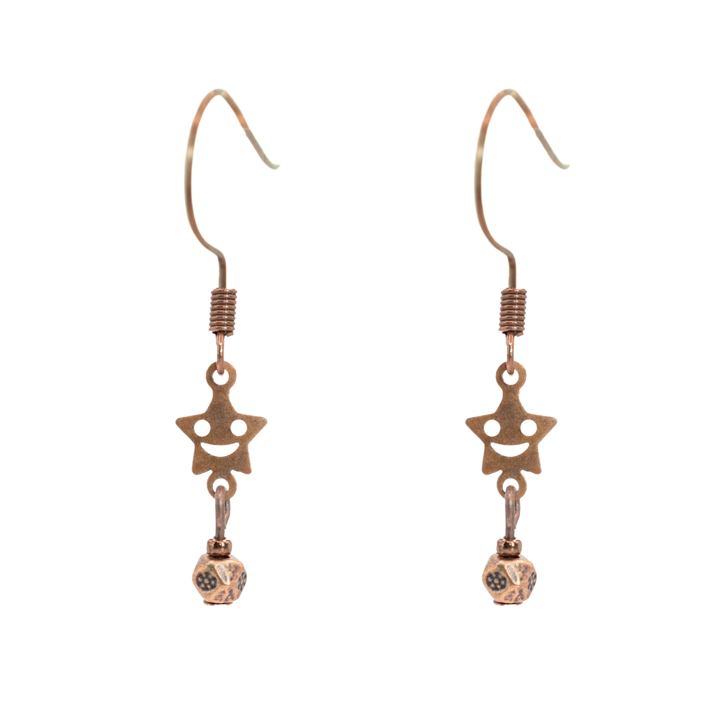 Pair of antique copper star-shaped smiley facew earrings on a white background