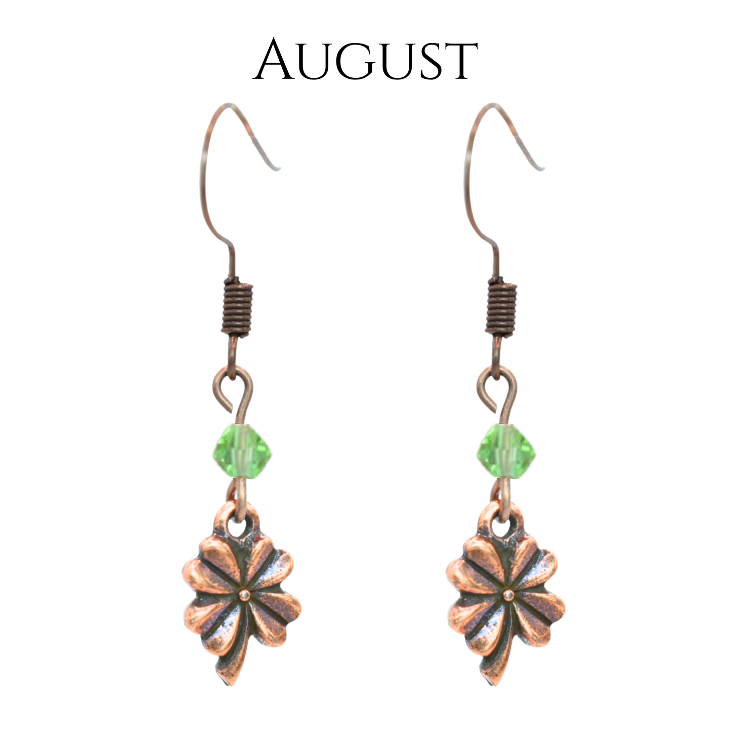 earrings featuring antique copper four leaf clover charms and Austrian crystal beads in August birthstone colors