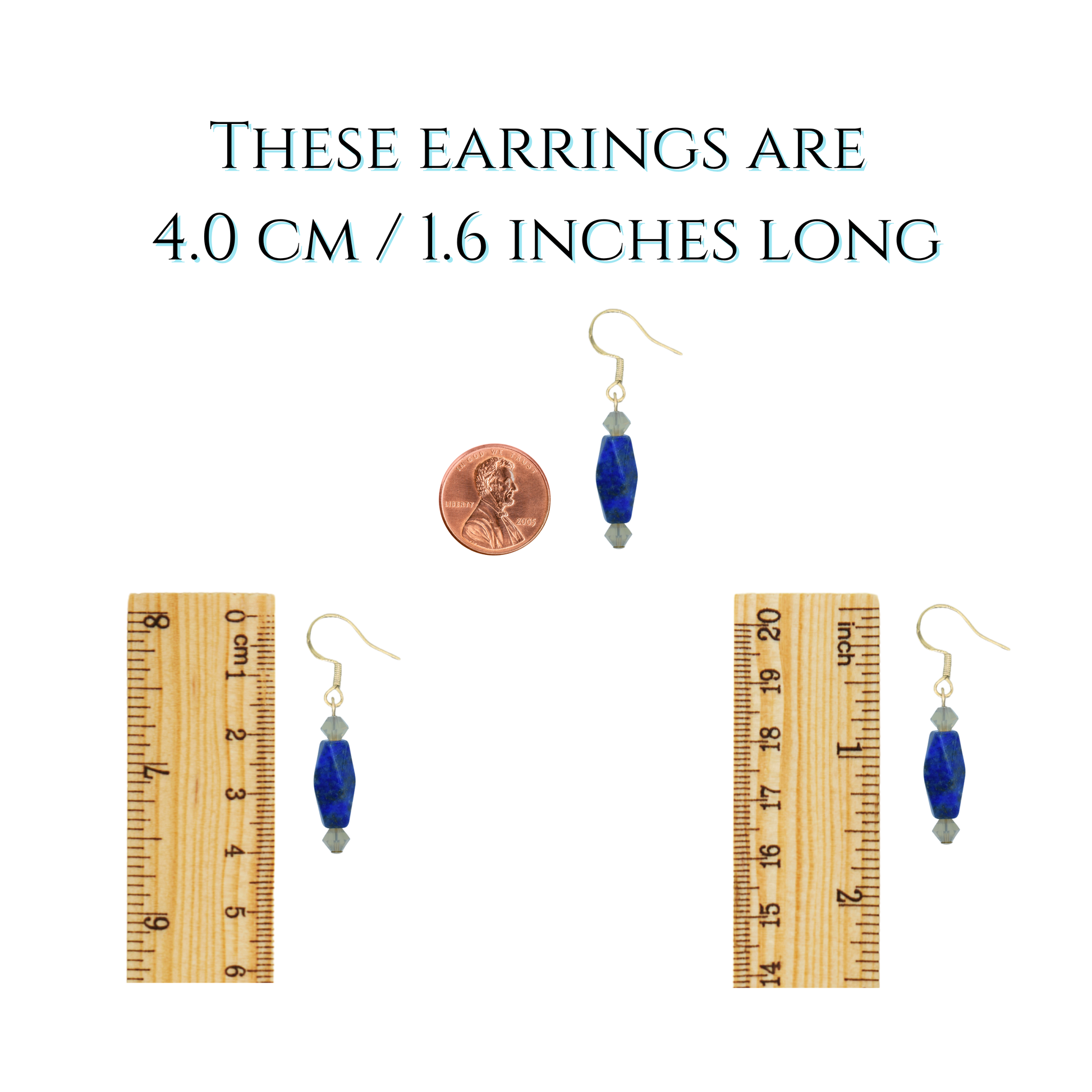 Pair of earrings with a penny and ruler for size reference on a white background
