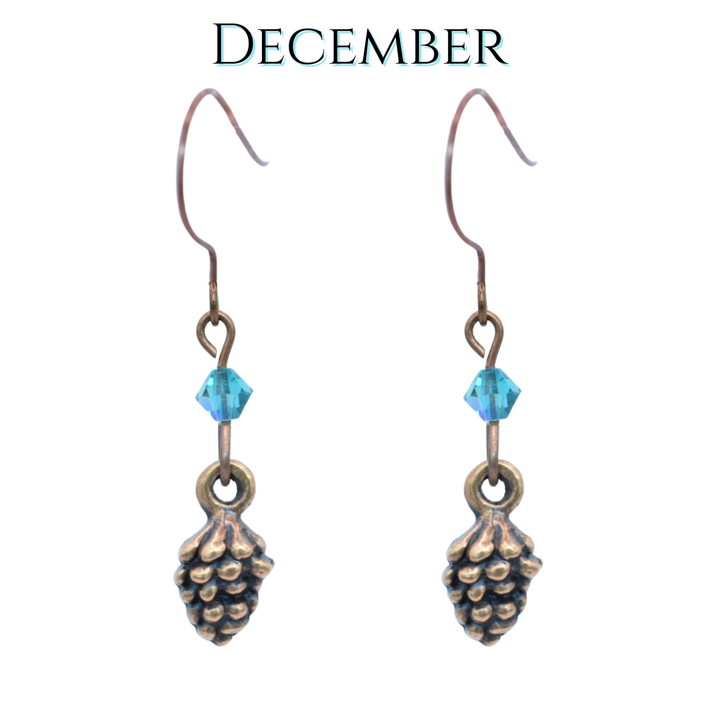 Pine cone-shaped earrings with teal blue crystal beads on a white background, labeled 'December'.