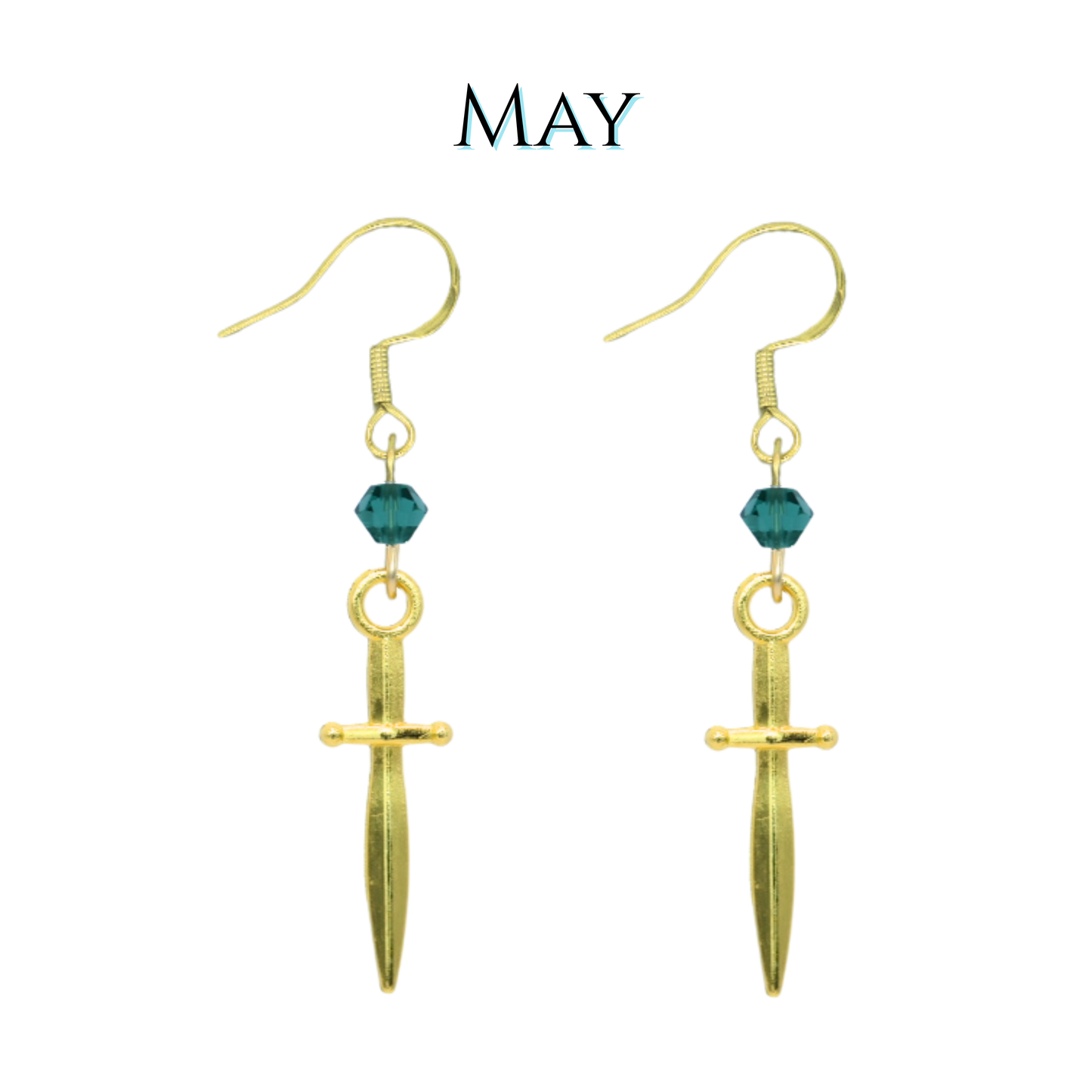 Gold dagger-shaped earrings with green crystal beads on a white background, labeled 'MAY'.