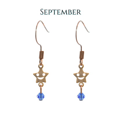 Star-shaped earrings with blue beads on a white background, labeled 'September'.