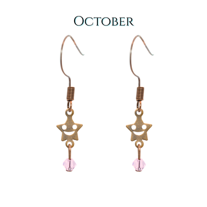 antique copper star-shaped earrings with pink beads on a white background, labeled 'October'.