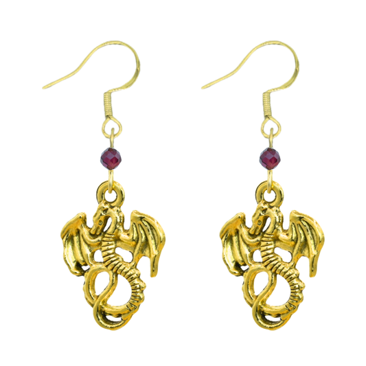 Gold dragon earrings with red beads on a white background