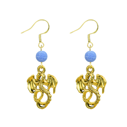 Gold dragon earrings with blue beads on a white background