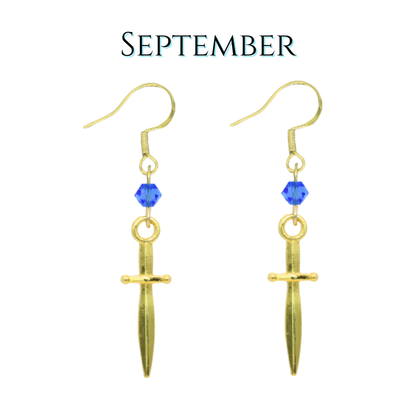 Gold sword-shaped earrings with blue crystal beads on a white background, labeled 'September'.