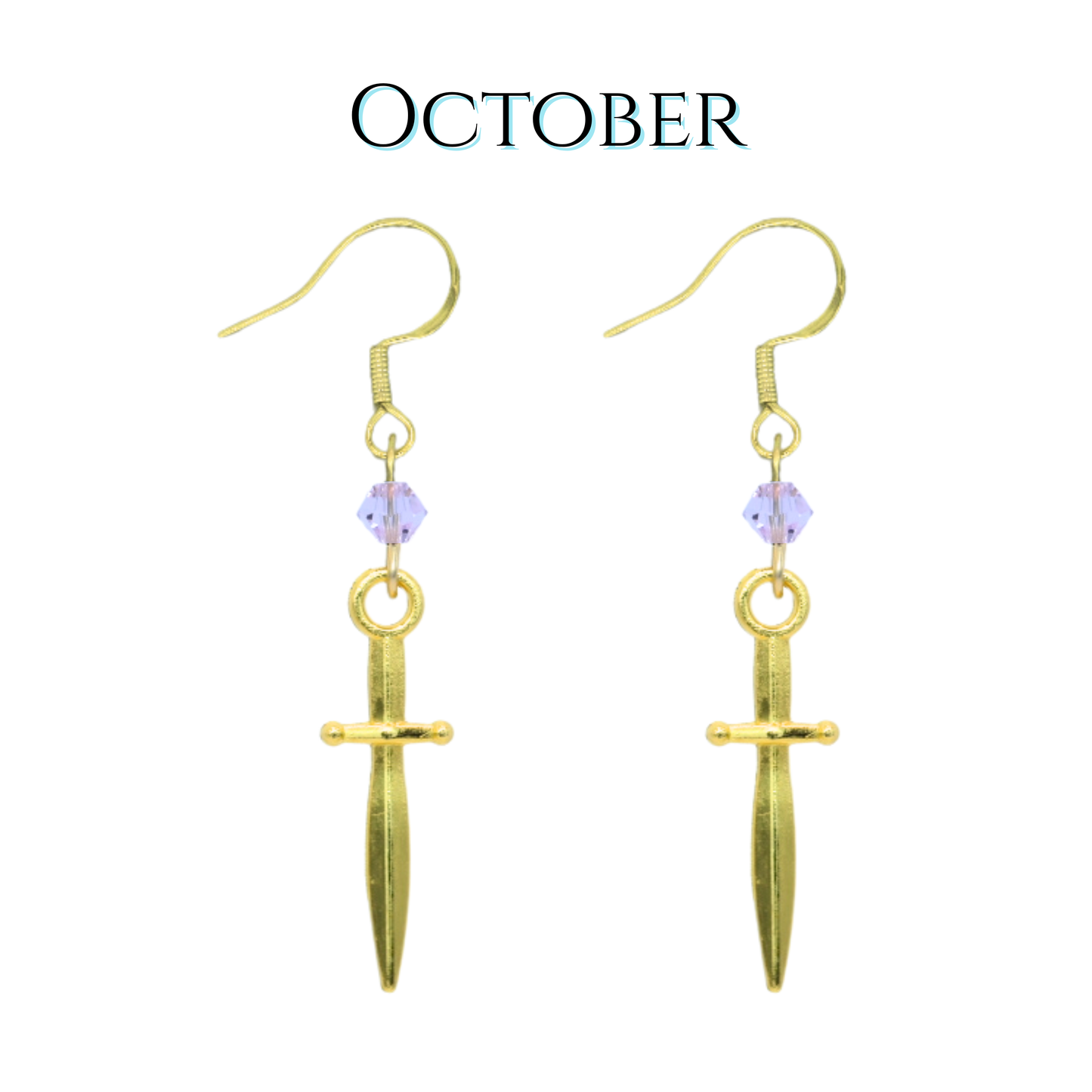 Gold dagger-shaped earrings with light pink crystal beads on a white background, labeled 'October'.