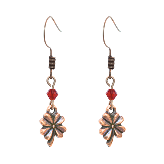 earrings featuring antique copper four leaf clover charms and Austrian crystal beads
