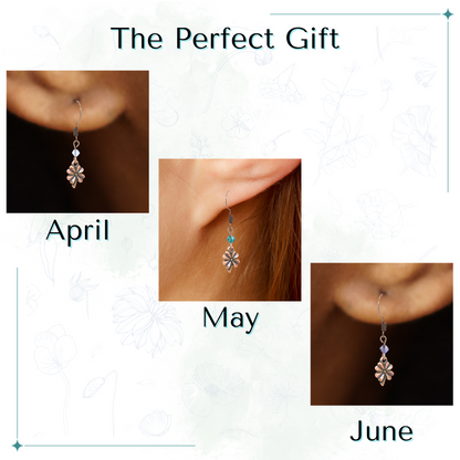 Custom birthstone earring worn on an ear with text 'Custom Birthstone Antique Copper Crystal Four Leaf Clover Earrings Made to Order'.