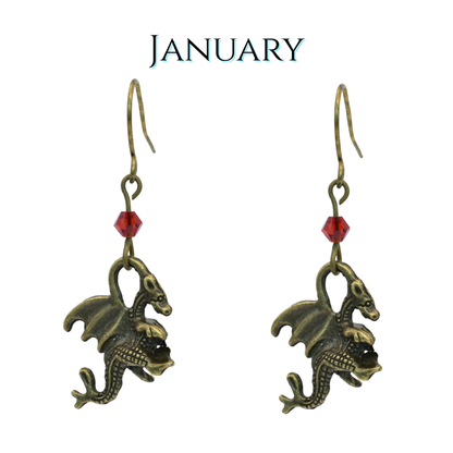 earrings featuring antique bronze dragon charms and red crystal beads, image has text "January"