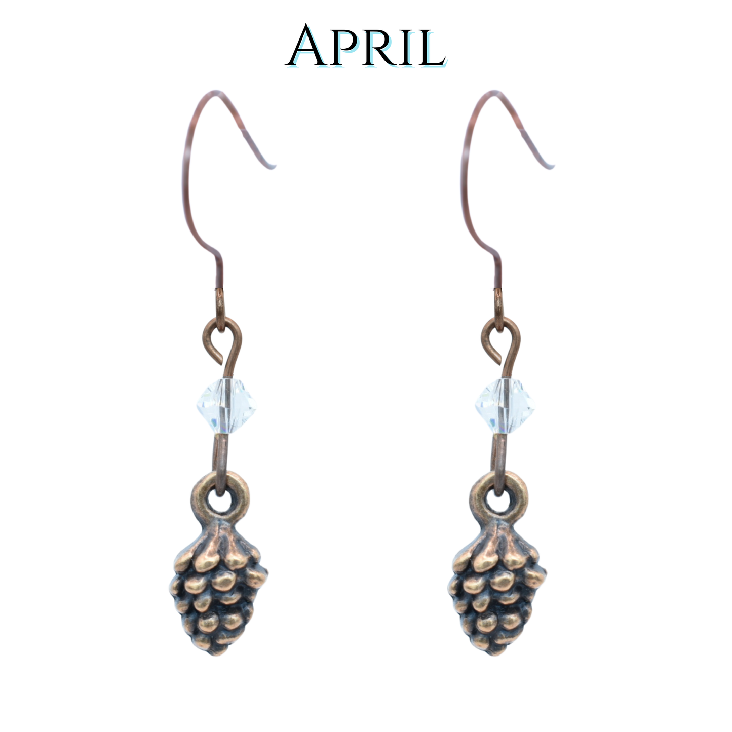 Antique copper pinecone-shaped earrings with clear crystals on a white background, featuring the word 'APRIL'.