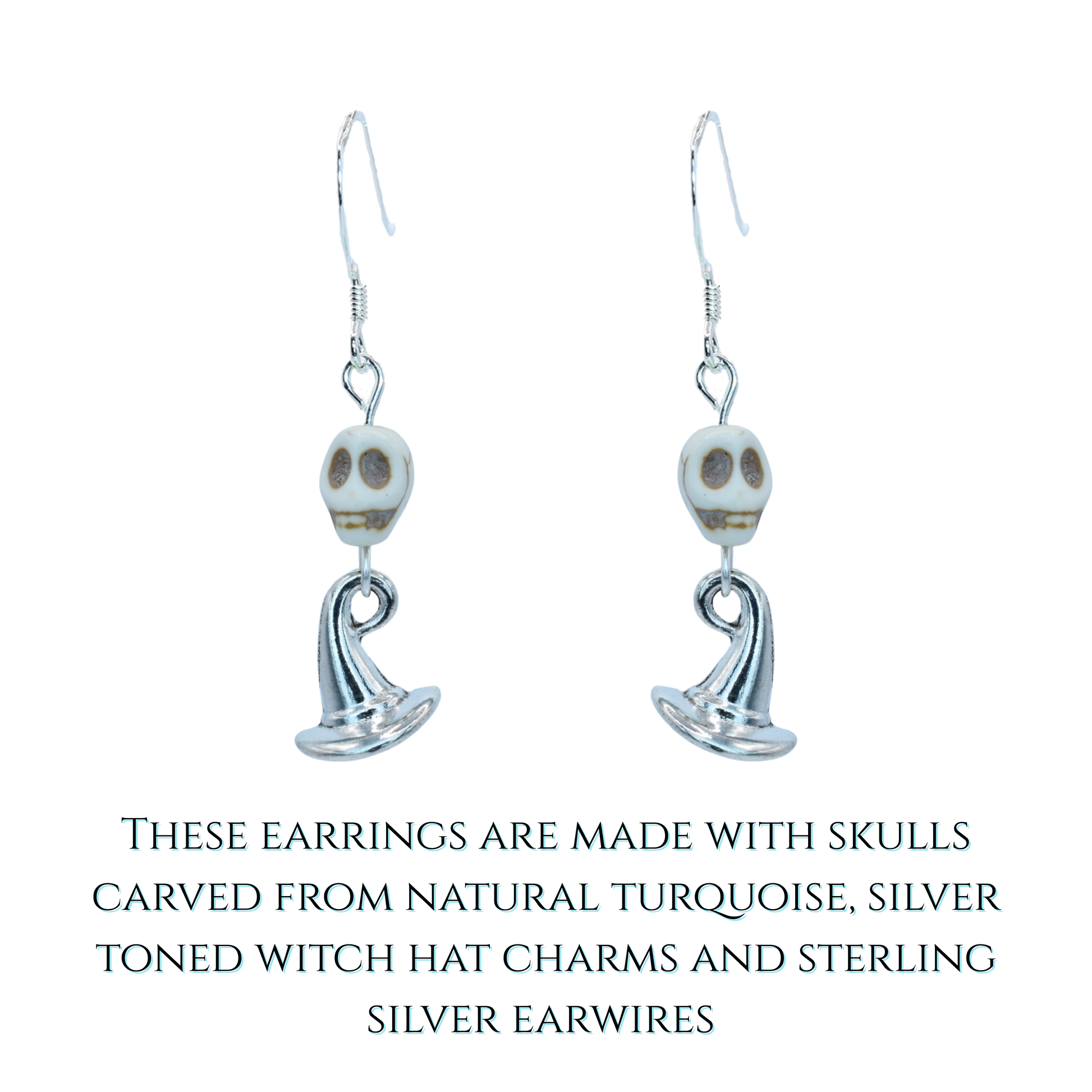 Pair of earrings with skull designs on a white background