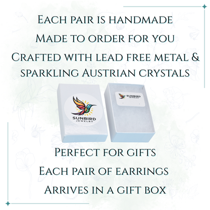 Sunbird Jewelry boxes with text about handmade earrings made with lead-free metal and Austrian crystals.