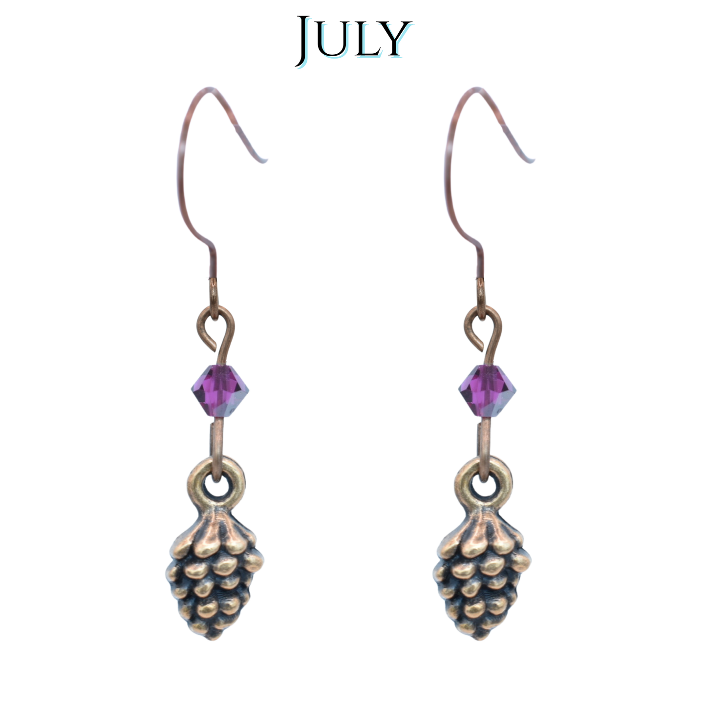 Antique copper earrings with fuchsia pink crystal beads on a white background, labeled 'JULY'.