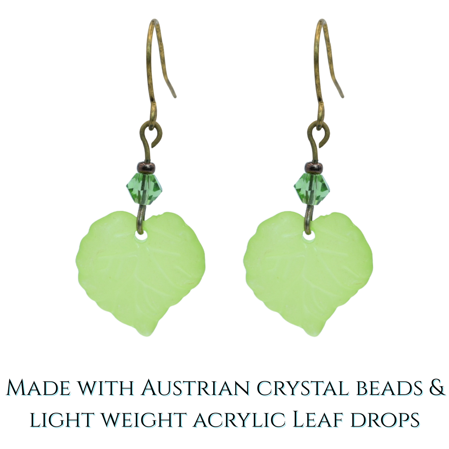 Green leaf-shaped earrings with Austrian crystal beads on a white background