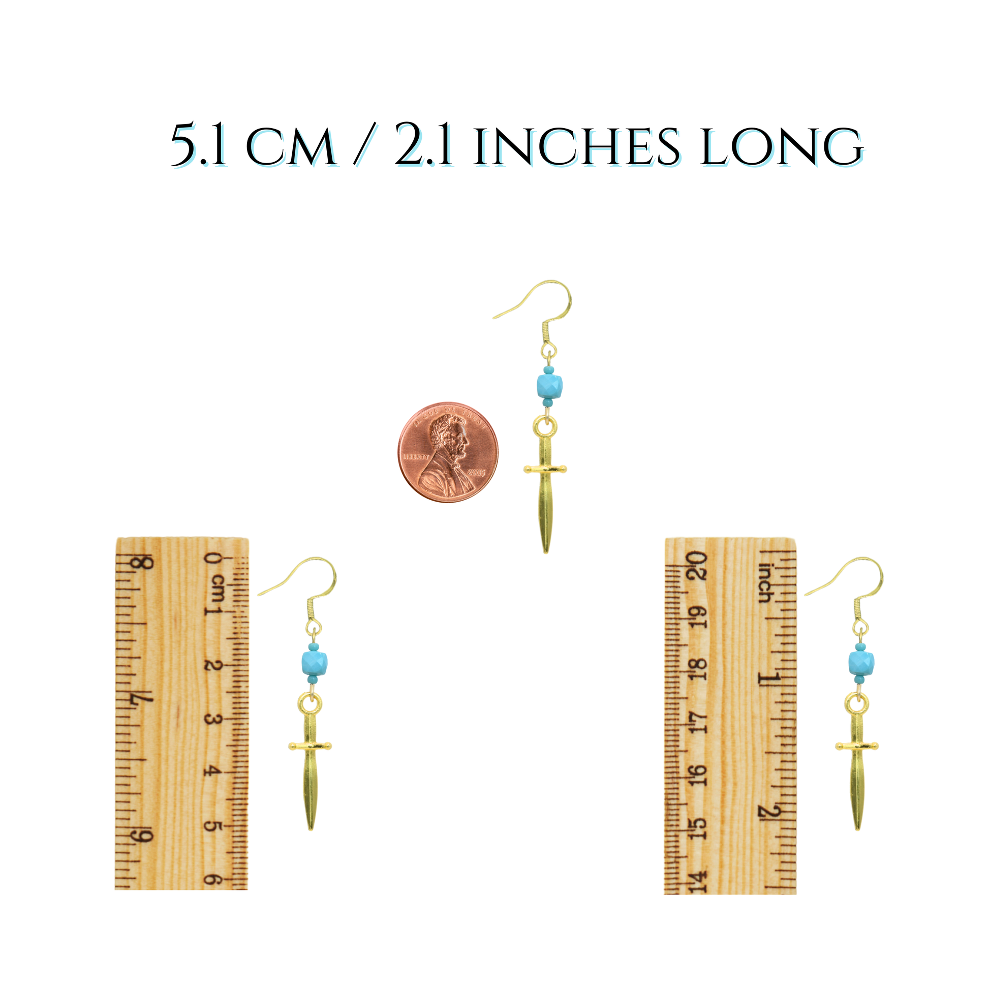 Gold sword-shaped earrings with blue beads next to a penny and two wooden rulers for size reference on a white background.