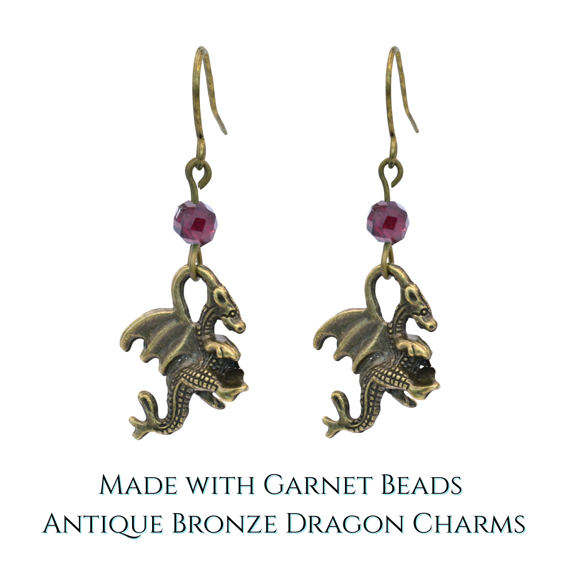 Pair of dragon-shaped earrings with garnet beads on a white background