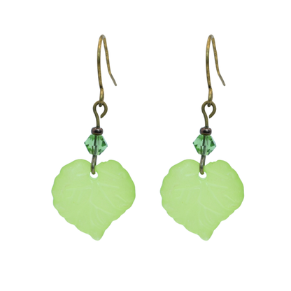 Leaf-shaped green earrings with small crystals on a white background