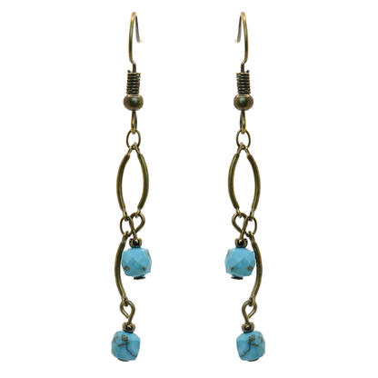 Pair of earrings with turquoise beads and bronze chain on a white background