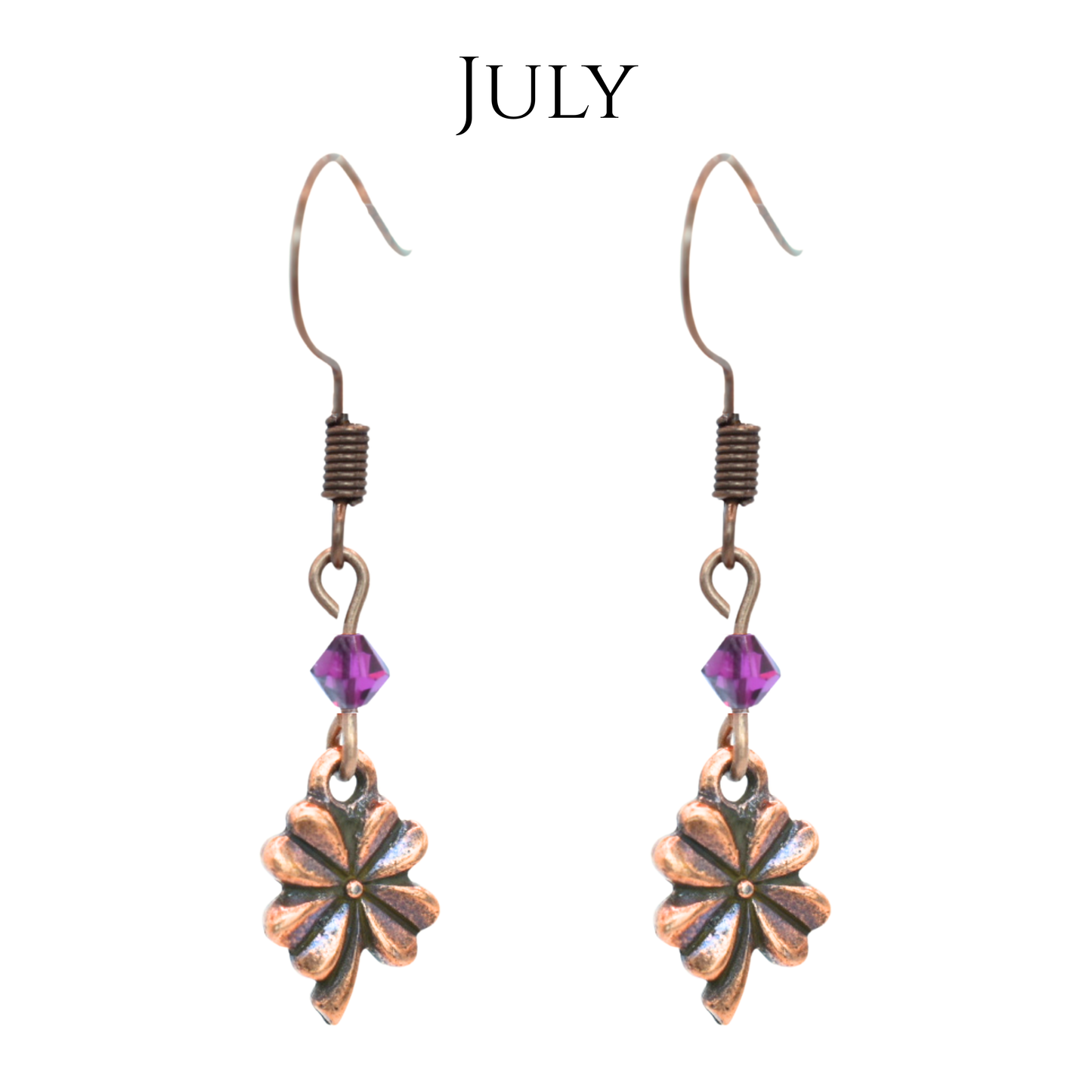 earrings featuring antique copper four leaf clover charms and Austrian crystal beads in July birthstone colors