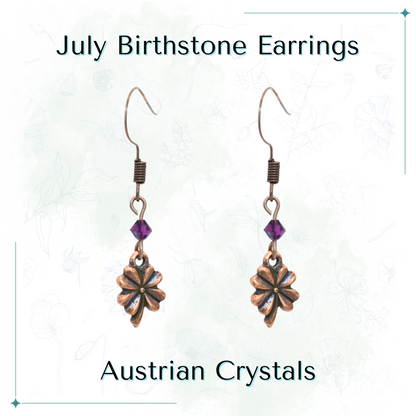 Antique copper earrings with pink Austrian crystals and a Four Leaf Clover charm on a white background, labeled 'July Birthstone 