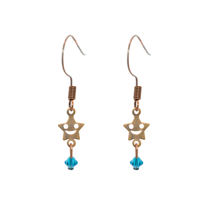 a pair of earrings featuring antique copper smiley face stars with crystal beads